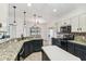 Kitchen with granite countertops, island, and stainless steel dishwasher at 759 Glendora Rd, Poinciana, FL 34759