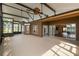Large lanai with ceiling fans and views from various windows and sliding doors at 759 Glendora Rd, Poinciana, FL 34759