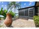 Beautiful brick patio with water view, ideal for outdoor enjoyment and relaxation at 759 Glendora Rd, Poinciana, FL 34759