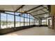 Enclosed lanai with ceiling fans and scenic lake views at 759 Glendora Rd, Poinciana, FL 34759