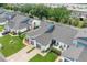 Well-maintained townhome community with manicured lawns and attached garages at 98 Lakepointe Cir, Kissimmee, FL 34743