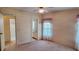 Spacious bedroom features carpeted floors, neutral walls and natural light at 509 Tivoli Park Dr, Davenport, FL 33897