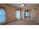 A bedroom showcasing a mirrored closet and natural light at 509 Tivoli Park Dr, Davenport, FL 33897