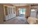 Dining area with built-in cabinetry, sliding glass door to the outside, and breakfast bar at 509 Tivoli Park Dr, Davenport, FL 33897