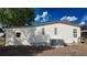 The property includes an air conditioning unit, and functional design, providing essential comfort at 509 Tivoli Park Dr, Davenport, FL 33897