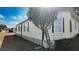 Charming home features a well-kept exterior with a lush tree, and tidy landscaping at 509 Tivoli Park Dr, Davenport, FL 33897