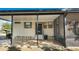 Exterior home view showcasing front porch, entry, and attached screened patio at 509 Tivoli Park Dr, Davenport, FL 33897