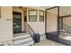 Welcoming front porch with steps, railing, and house number, perfect for entry at 509 Tivoli Park Dr, Davenport, FL 33897