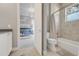 Attached bathroom in a 'Star Wars' themed room with a tub and shower combo at 1021 Castle Pines Ct, Reunion, FL 34747