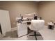 Dedicated work area with a modern desk, comfortable chair, and ample lighting, ideal for productivity at 11273 Amber Ridge Dr, Zellwood, FL 32798