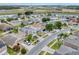 Scenic aerial shot of a residential neighborhood near a waterway, showcasing homes at 1176 Epson Oaks Way, Orlando, FL 32837