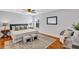Stylishly furnished bedroom with a large bed, area rug, ceiling fan and decorative pillows at 1176 Epson Oaks Way, Orlando, FL 32837