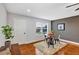 Cozy dining area with round table and backyard view at 1176 Epson Oaks Way, Orlando, FL 32837