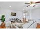 Comfortable living room features modern décor and an open layout at 1176 Epson Oaks Way, Orlando, FL 32837