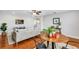 Bright living room with wood-look floors and modern décor at 1176 Epson Oaks Way, Orlando, FL 32837