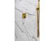 Elegant shower hardware with marble tiling at 1176 Epson Oaks Way, Orlando, FL 32837