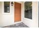 The front door features stylish accents and is flanked by windows at 1306 Harbor Ridge Dr, Kissimmee, FL 34759