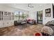Bright and airy living room with tile floors, comfortable seating, and large windows providing plenty of natural light at 1306 Harbor Ridge Dr, Kissimmee, FL 34759