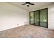 Covered outdoor patio with brick flooring, ceiling fan, and sliding glass doors to the home at 1306 Harbor Ridge Dr, Kissimmee, FL 34759