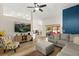 Bright living space with an open layout, connecting seamlessly to an outdoor patio at 131 Highland Meadows Pl, Davenport, FL 33837