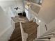Bright foyer featuring modern light fixture, staircase, fireplace, and open-concept living area at 1505 Chevington Ct, Orlando, FL 32824