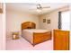 This bedroom features a ceiling fan, ample lighting, and neutral colors at 156 Bristol Forest Trl, Sanford, FL 32771