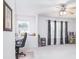 Open and airy room with large windows, decorative curtains and a ceiling fan at 156 Bristol Forest Trl, Sanford, FL 32771