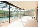 Enclosed pool area with a rock feature, offering a secure and enjoyable outdoor space at 156 Bristol Forest Trl, Sanford, FL 32771