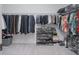 The spacious walk-in closet has built-in shelving and ample storage space at 156 Bristol Forest Trl, Sanford, FL 32771