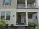 Charming two-story home featuring a covered entry, neat landscaping, and a cozy front porch at 15929 Moonlight Bay St, Winter Garden, FL 34787