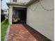 Relaxing covered patio with decorative lighting, ideal for outdoor living and entertainment at 15929 Moonlight Bay St, Winter Garden, FL 34787