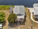 Aerial view of a single-story home on the water at 1626 Salmon St, St Cloud, FL 34771