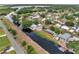 Aerial view of homes lining a canal and lake at 1626 Salmon St, St Cloud, FL 34771