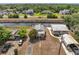 Aerial view of waterfront homes along a canal, surrounded by lush trees at 1626 Salmon St, St Cloud, FL 34771
