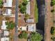 Aerial view of the property near a waterway with a small dock at 1626 Salmon St, St Cloud, FL 34771