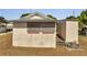 Exterior elevation of a single story home featuring blocked windows at 1626 Salmon St, St Cloud, FL 34771