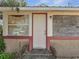 Inviting front entrance with a white door, framed by colorful brick accents at 1626 Salmon St, St Cloud, FL 34771