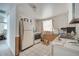 Kitchen featuring essential appliances and simple cabinetry, needing updates at 1626 Salmon St, St Cloud, FL 34771