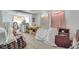 A living room filled with discarded furniture, appliances and other clutter at 1626 Salmon St, St Cloud, FL 34771
