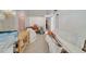 A living room with furniture and random items at 1626 Salmon St, St Cloud, FL 34771