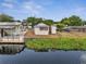 Single-story home on the water with a nice dock and lake view at 1626 Salmon St, St Cloud, FL 34771