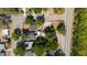 Overhead view of the property highlighting its proximity to local streets, surrounded by mature trees at 1814 Leroy Dr, Haines City, FL 33844
