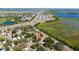 Explore this home's location via aerial view, surrounded by scenic lakes and a vibrant community at 1814 Leroy Dr, Haines City, FL 33844