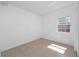 A small bedroom with tile floors and white walls at 1814 Leroy Dr, Haines City, FL 33844