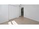 A small bedroom with tile floors and white walls at 1814 Leroy Dr, Haines City, FL 33844