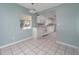 Open kitchen design with white cabinetry, modern appliances, and ample natural light at 1814 Leroy Dr, Haines City, FL 33844