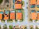 Aerial view showcasing the roof, backyard and location of the property at 209 Rosso Dr, Davenport, FL 33837
