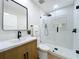Bathroom features glass shower, modern fixtures, and stylish vanity at 217 W Bay St, Winter Garden, FL 34787
