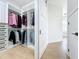Custom walk-in closet featuring natural light and storage at 217 W Bay St, Winter Garden, FL 34787