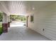 Long, covered driveway with ample space, offering convenient access to the house at 217 W Bay St, Winter Garden, FL 34787